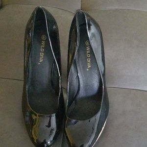 Black faux patent leather heels with cork heels